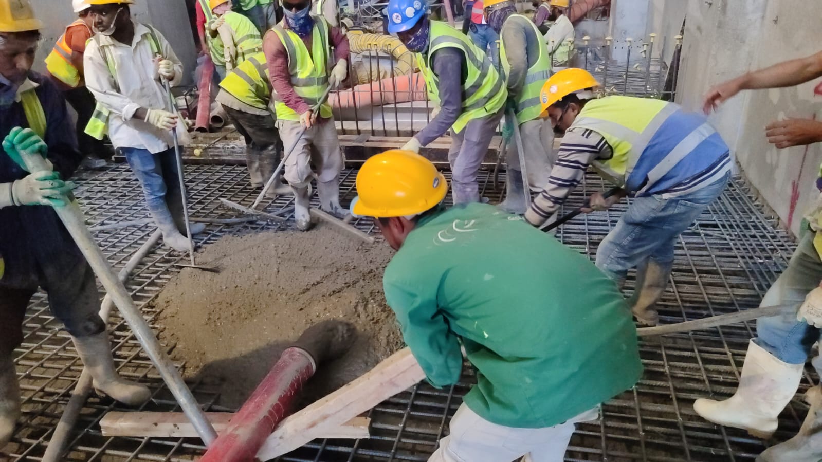Active concrete pour in progress at Misk City basement